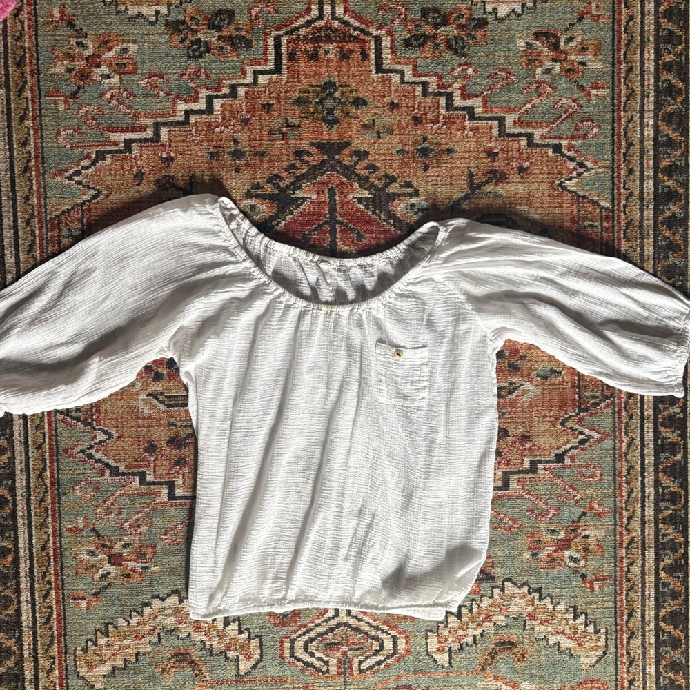 White lightweight peasant blouse with pocket